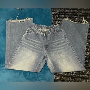 Distressed high-waisted wide-leg jeans